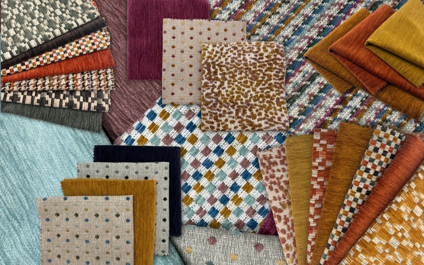 A colorful flat lay of The Art of Chenille collection by Revolution Performance Fabrics, featuring patterned and solid chenille upholstery swatches in warm golds, blues, and berry tones. 