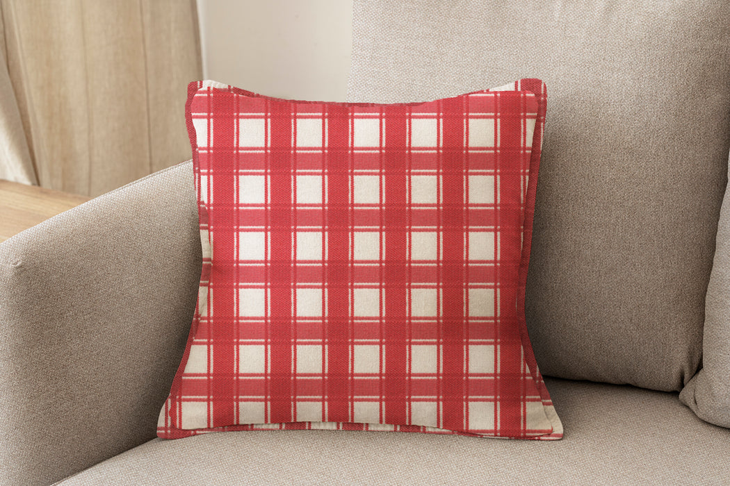 Decorative pillow upholstered in Revolution Performance Fabric Denmark Cherry, featuring a vibrant red plaid pattern with layered vertical and horizontal bands that create a classic, tailored aesthetic. The performance construction makes it ideal for everyday family-friendly living.
