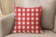 Decorative pillow upholstered in Revolution Performance Fabric Denmark Cherry, featuring a vibrant red plaid pattern with layered vertical and horizontal bands that create a classic, tailored aesthetic. The performance construction makes it ideal for everyday family-friendly living.