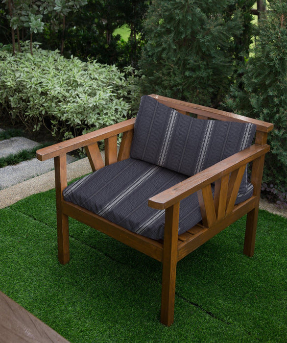 Revolution Performance Fabric outdoor chair cushions in the Lloyd pattern, Ebony colorway, featuring deep charcoal and ivory woven stripe detailing for durable, high-performance outdoor seating.