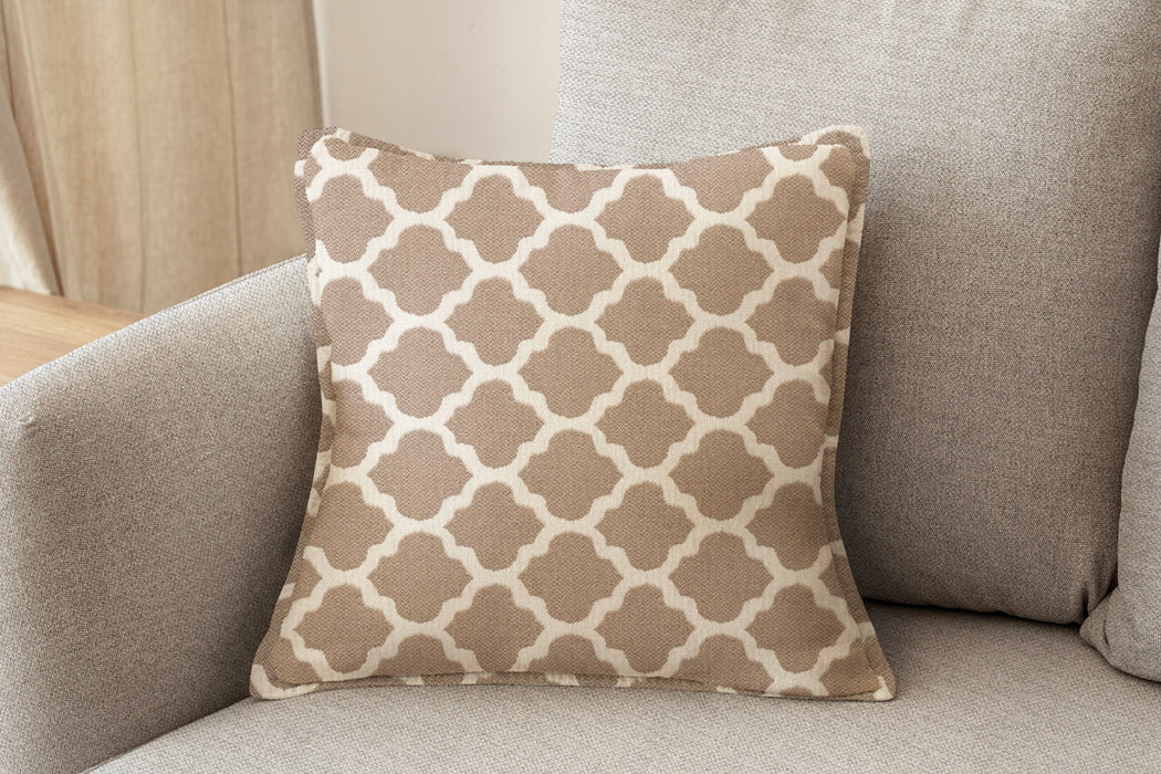 Revolution Performance Fabric accent pillow in the Metalwork pattern, Sand colorway, showcasing a warm beige and ivory geometric trellis design woven for high-performance upholstery and refined interior styling.