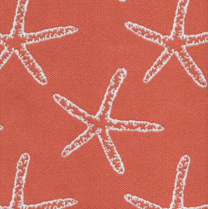 Revolution Performance Fabric, pattern Seastar in the color Mango, featuring crisp white starfish motifs woven over a deep teal-green background for a coastal-inspired upholstery look with durable performance appeal.
