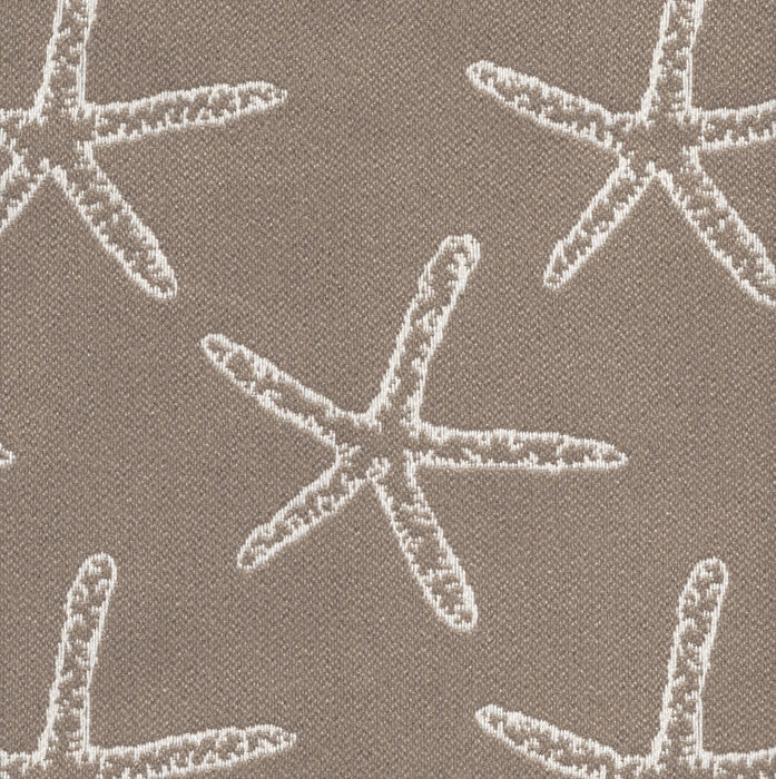 Revolution Performance Fabric, pattern Seastar in the color Sand, featuring crisp white starfish motifs woven over a deep teal-green background for a coastal-inspired upholstery look with durable performance appeal.