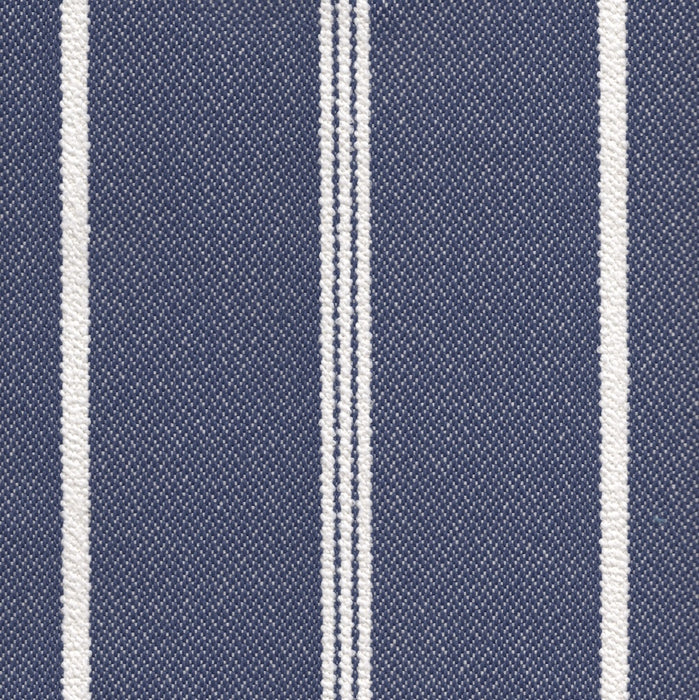 Revolution Performance Fabric, pattern Starboard in the color Navy, featuring bold navy blue vertical stripes against an ivory background for a timeless nautical stripe upholstery fabric with durable performance properties.