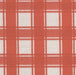 Flat view of Revolution Performance Upholstery Fabric in Denmark Mango, featuring a vibrant orange plaid pattern with layered vertical and horizontal bands that create a timeless, tailored look. The tightly woven texture enhances the clean structure of the design.